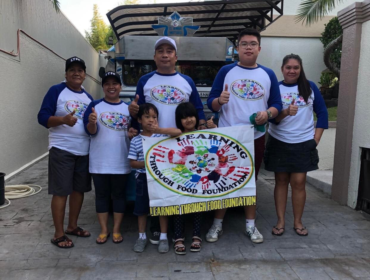 Community team with Learning Through Food banner